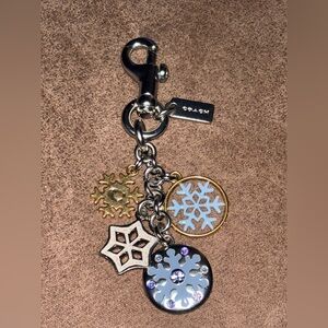 Coach winter Snowflake cluster bag charm/keychain. Feature 5 charms collectable